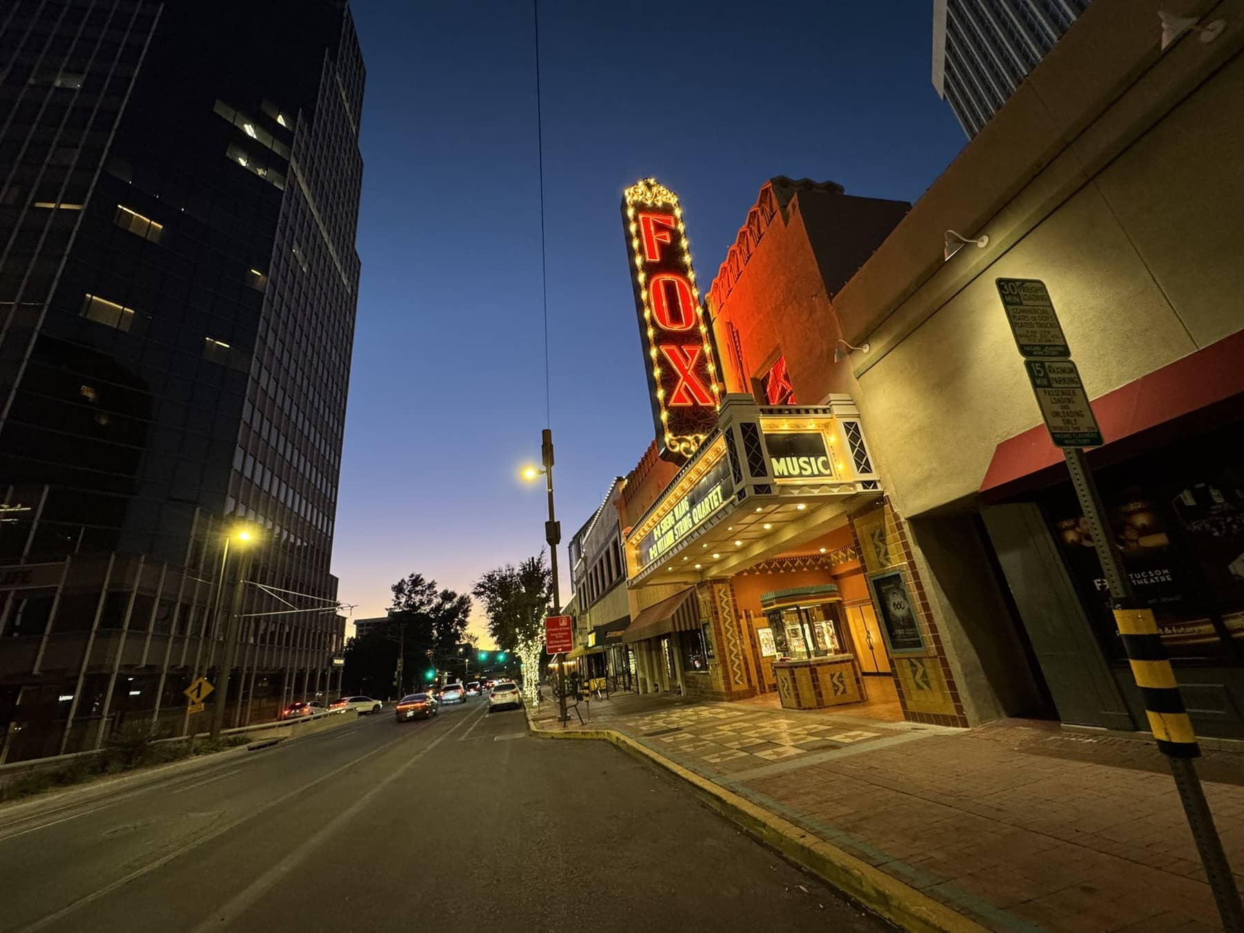 Congress Street and the Fox Theatre marquee at dusk in downtown Tucson